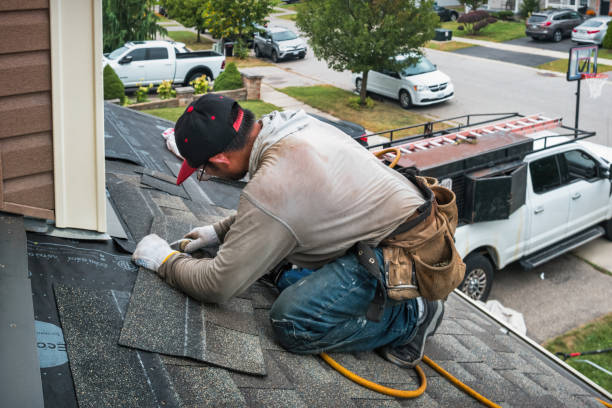 Professional Roofing technician working in Bolton, MA